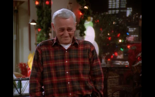 Martin Crane beams at Frasier after getting him the outlaw laser robo geek. 