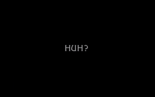 A black intertitle card with white text reads "Huh?"